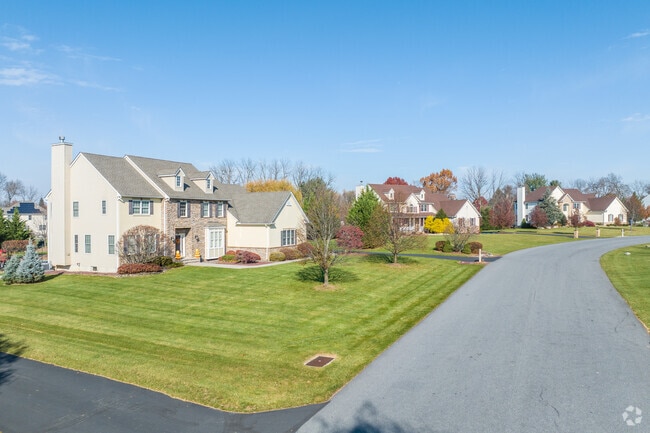 Rows of large Modern Colonial homes line the streets of Lower Nazareth Township.