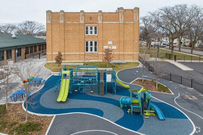 A large playground awaits the students of Addams Elementary School in Chicago's East Side area.