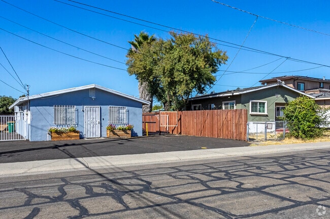 A group of colorful older homes line the streets in the Kennedy area of Stockton.
