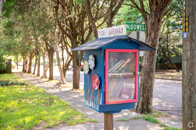 A free little library sits on the corner in front of a residence in Midtown Augusta.