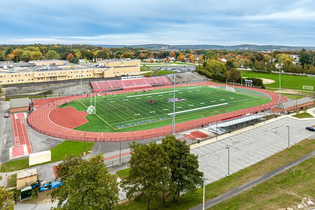 Manchester Memorial High School and the Clem Lemire Athletic Complex.