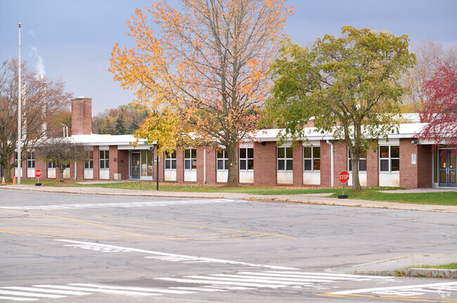Mendon Center Elementary School serves K-5 students with a student population of 638.