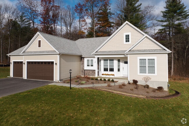 A cape ranch style home with a garage in is a fresh new construction in Milton, NY.