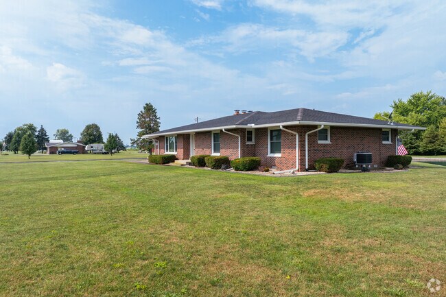 A bit further out from town, brick ranch-style homes with large yards speckle the Ohio plains.