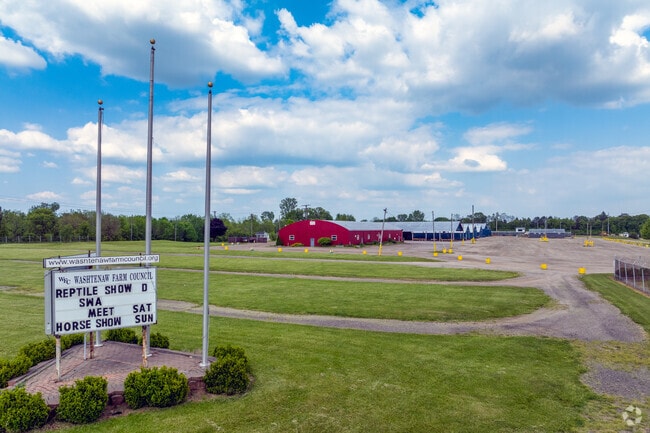 The Washtenaw Farm Council Grounds hosts fairs and competitions, located in Travis Pointe.