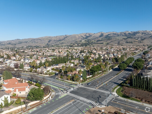 Murillo offers modern suburban living in Evergreen Valley with stunning foothill views.