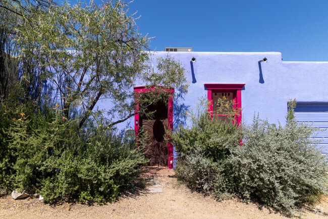 Eccentric colors on Spanish and Pueblo-style architecture stands out in Barrio Santa Rosa.