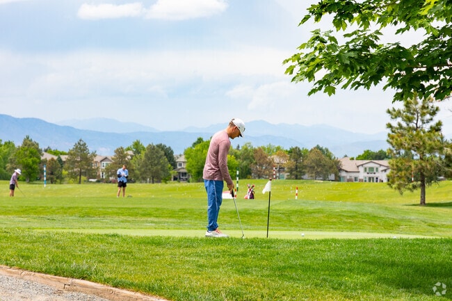 Practice your swing at the University of Denver Golf Club near Sterling Ranch.