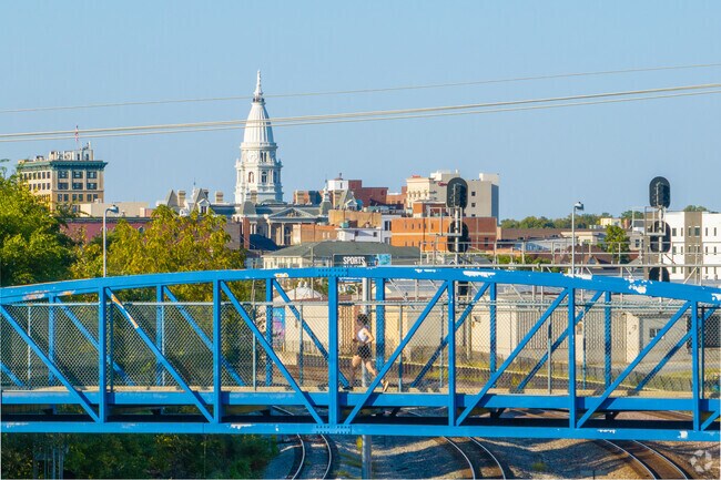 Look over at Downtown Lafayette as you run across the footbridge back to your home in Miller.
