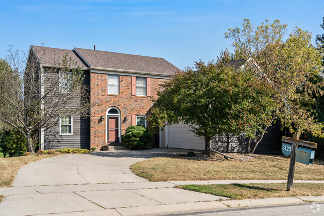 Foxcroft's traditional homes blends clean lines and spacious layouts on tree-lined street.