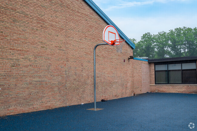Practice your basketball skills on the playground at Cooley Elementary School.