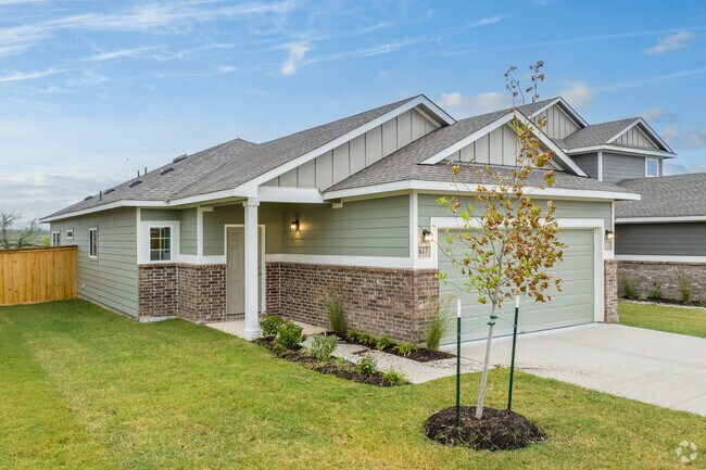 In Jarrell's community, find beautifully landscaped single-story homes with brick facades.