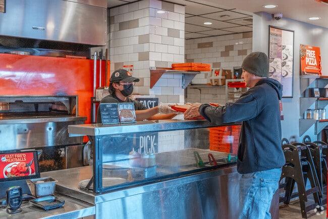 Get your fresh and custom made pizza to go from Blaze Pizza in nearby Hicksville.