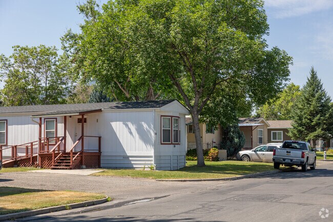 Cozy mobile homes surrounded by greenery in North Central Helena.