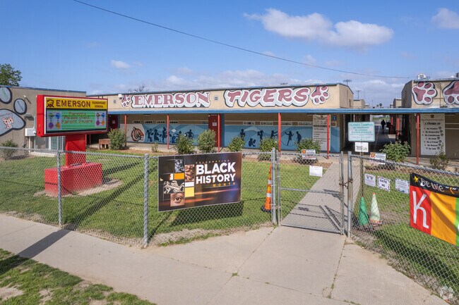 The entrance sign and walkway to Emerson Elementary School.
