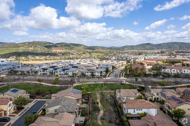 Arial View of Residential Area and Surrounding Mountains in Del Sur Neighborhood.