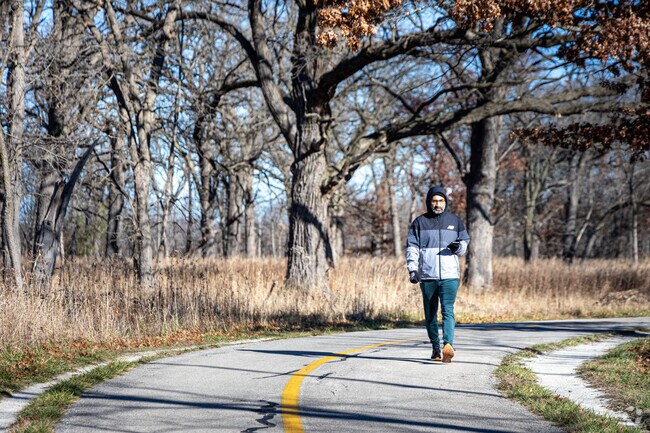 The paved North Branch Trail winds through the forest preserves in The Terrace.