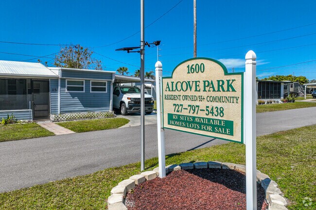 Alcove signage welcomes residents home to the mobile home community.