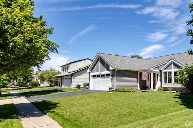 Late 20th-century homes sit on residential streets nearby at Corley Drive Park.
