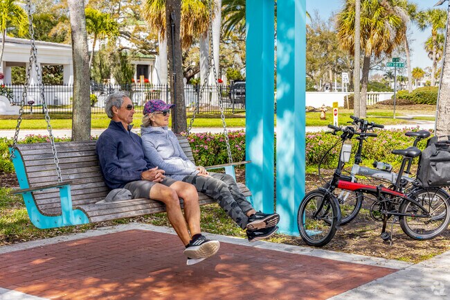 Take a break from riding your bikes & enjoy the swings in Flora Wylie park.