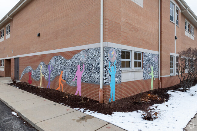 There is a mural on the corner of Heritage Middle School.