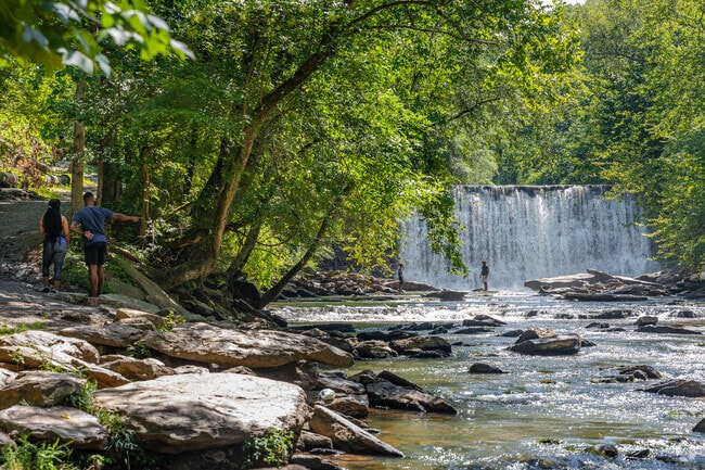 Visitors appreciate the scenic trails at the creek and Roswell Mill Waterfall.