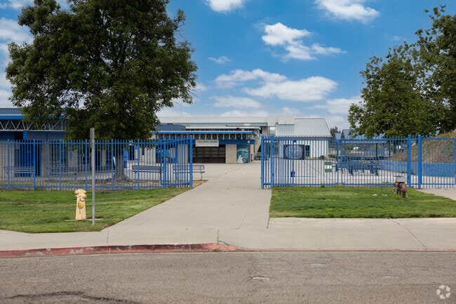 Students walk through the gates after drop off at Olive Peirce Middle School in Ramona, CA.
