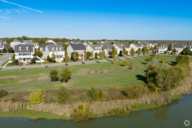 Some homes in Bristow overlook a scenic lake.