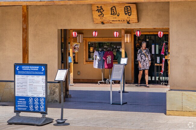 Visitors enter the Japanese Friendship Garden, a tranquil oasis featuring koi ponds, tea ceremonies, and carefully curated landscapes that reflect traditional Japanese design.