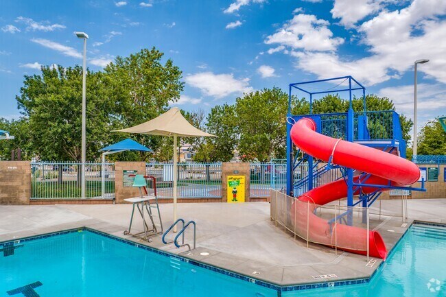 Wells Park features a full pool with waterslide, playground and exercise trails.