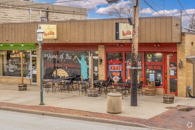 Enjoy a warm slice of pizza at Roc-A-Fellas Pizza in Sharonville.