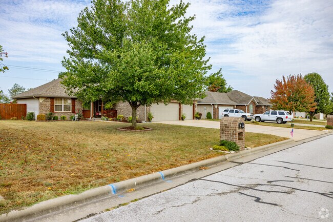 Willard streets are lined in subdivisions with mid-20th century and modern homes.