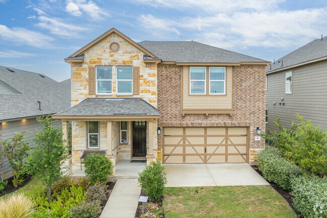 Discover unique two-story homes with stunning stone work in Jarrell.