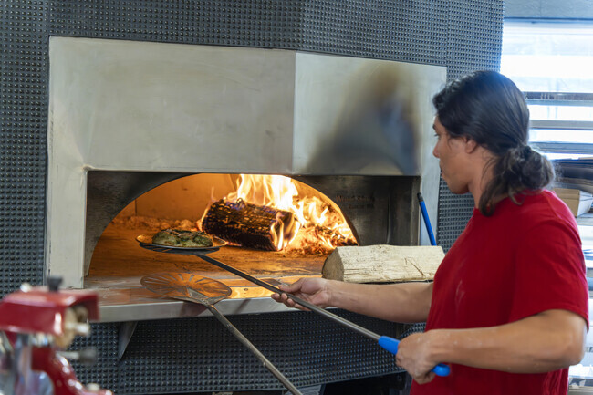 In Kerrytown Pizza Pizza serves their famous wood fired pizza.