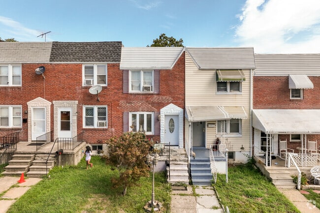 Charming brick row homes in Morrell Park showcase Baltimore’s classic neighborly spirit.