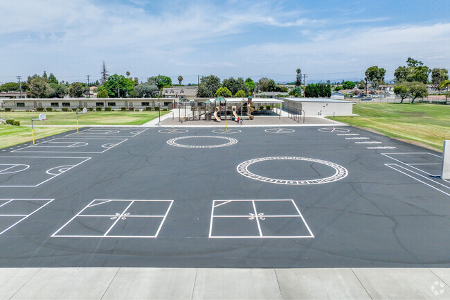 A classic blacktop encourages students to play together at  Holder Elementary.