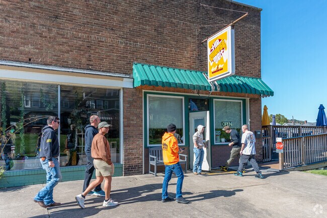 The Cheese Melt Grill and Bar is locally owned and offers live music on the weekends in Warwood.