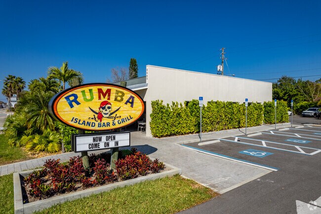 Stop by the local Rumba Island Bar & Grill for coastal cuisines in Fossil Park, FL.