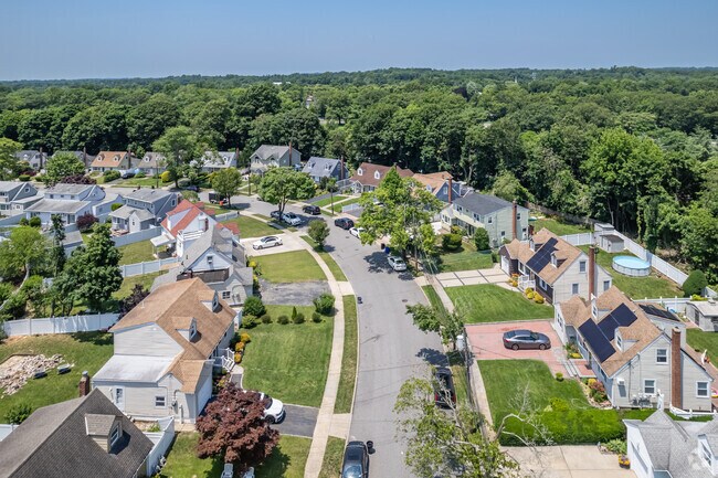 An aerial look at Westbury shows its quaint homes with well manicured lawns.