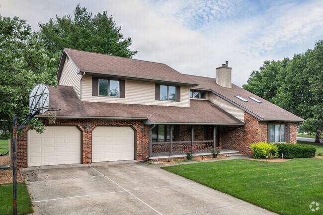 Unique two-story brick homes with multi-car garages are found in Koke Mill East.