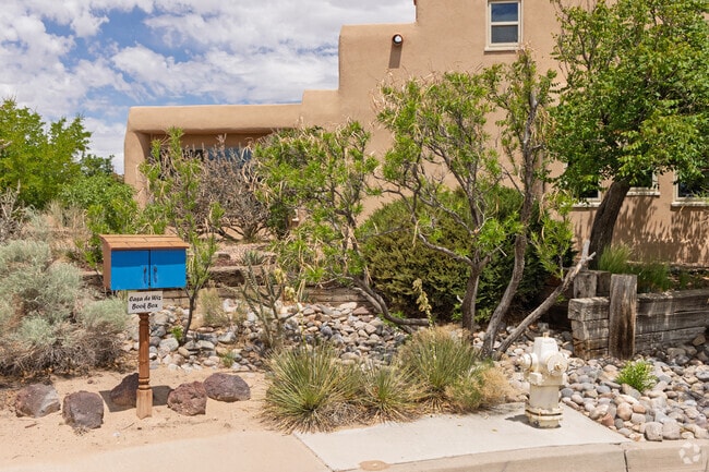 The neighborhood features natural landscaping and a variety of architectural styles.