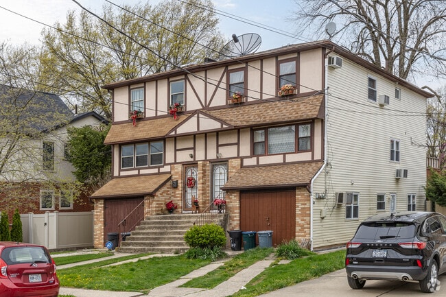 A semi-detached multi-family colonial house in Dongan Hills.