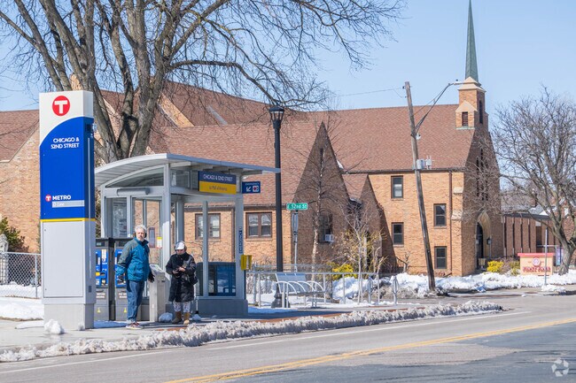 People wait for the bus on Chicago Ave in the Page neighborhood.