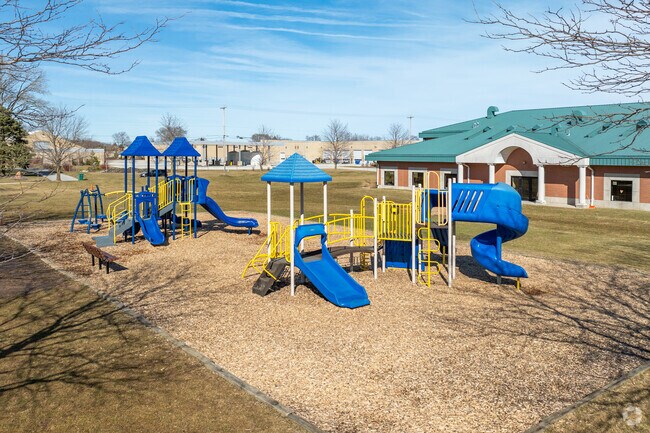 Children at Aquinas Academy in Menomonee Falls, WI can play on the playground during break.