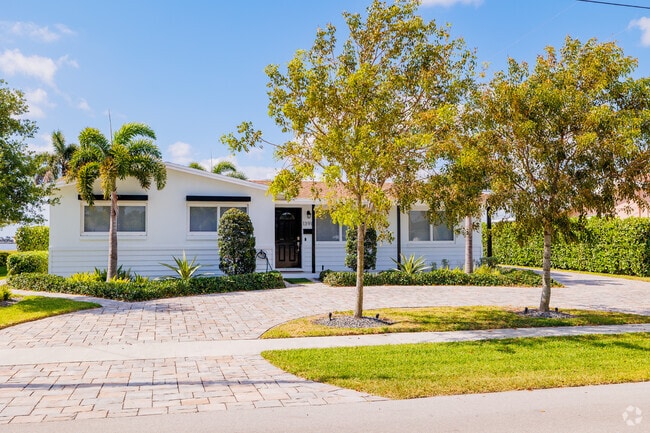 A timeless ranch home exuding elegance in Roosevelt Estates.