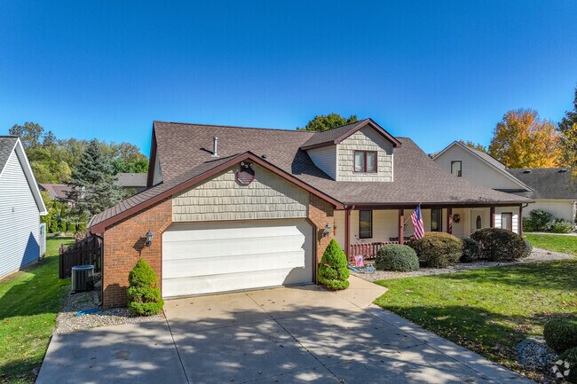 Spacious 1950s home with a large garage adds vintage charm.
