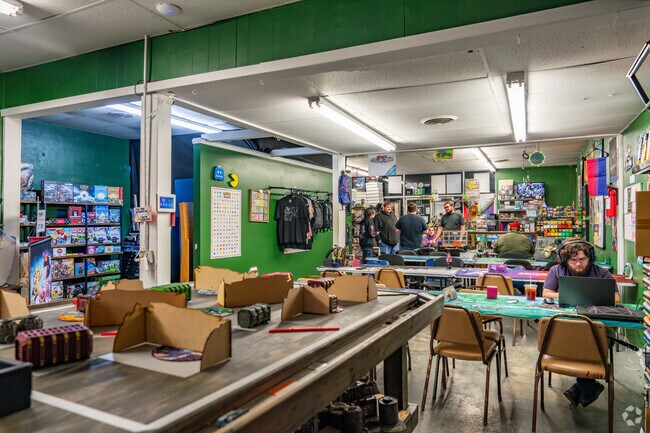 Current: Coffee + Collectibles is a gaming shop and cafe near Delano Park.