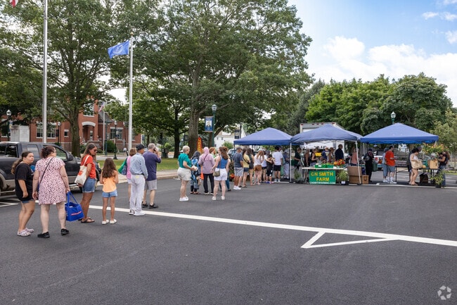 Folks like up for fresh produce at the Braintree Farmers Market in South Braintree.