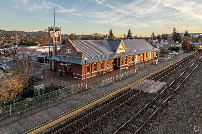 Railroad tracks pass through Kelso’s Amtrak station, paralleling the Cowlitz River.