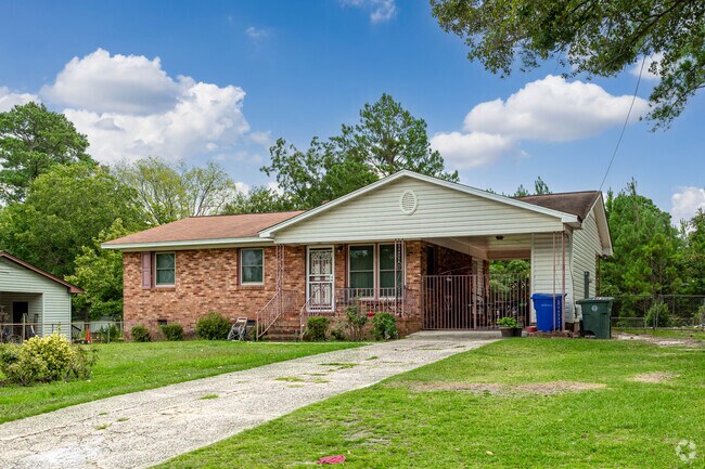 Southern style ranches are abundant with brick and wood siding in Lake Pines.